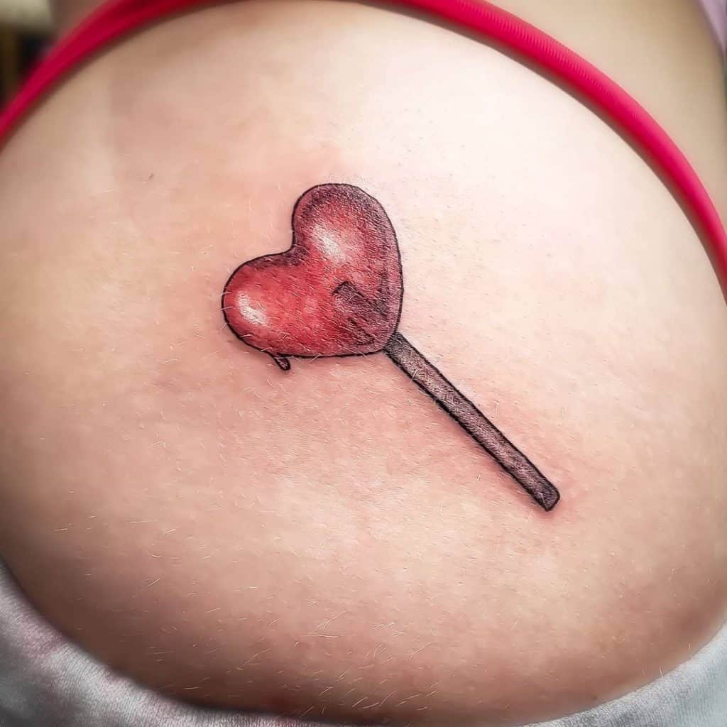 Red Heart Lollipop Hip Tattoo 