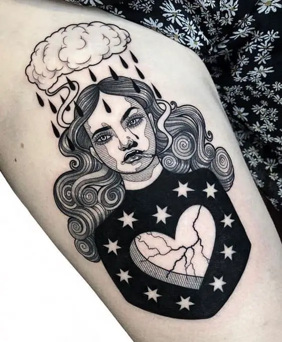3. Moody Black Heart Tattoo With A Woman Image