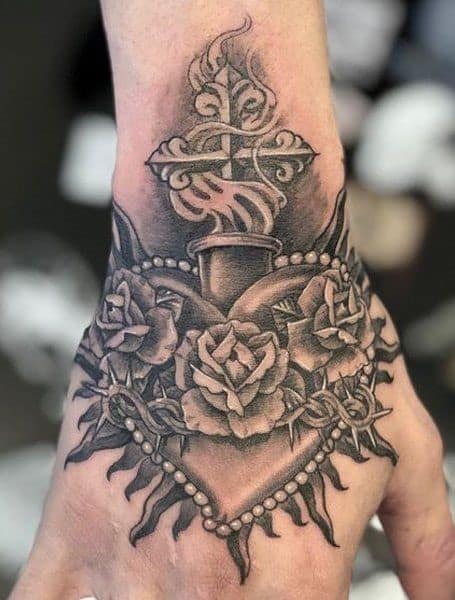 4. Sacred Heart And A Sword Tattoo Image