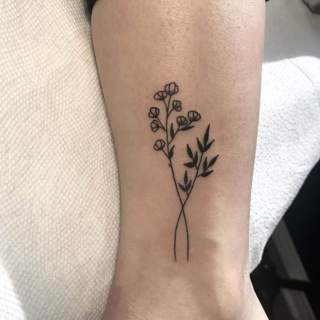 Ankle Inspired Flower Tattoo