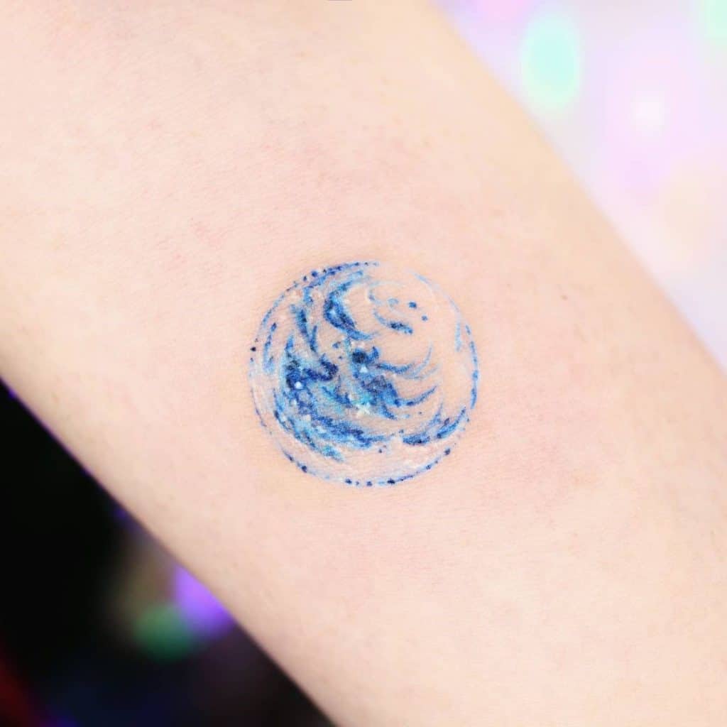 Bright Blue Small Tattoo Over Forearm