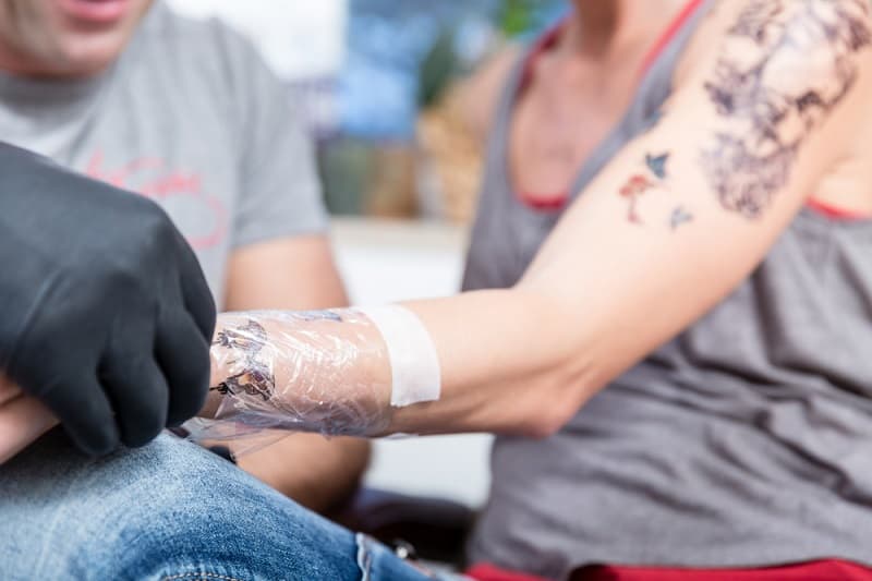 Can You Swim After Getting A Tattoo? Is It Safe? - Saved Tattoo