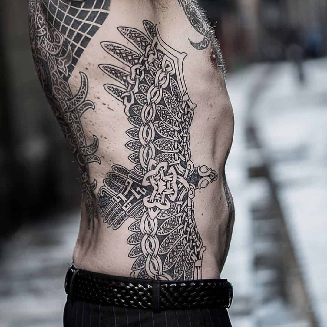 Mandala Inspired Raven Tattoo On Stomach 