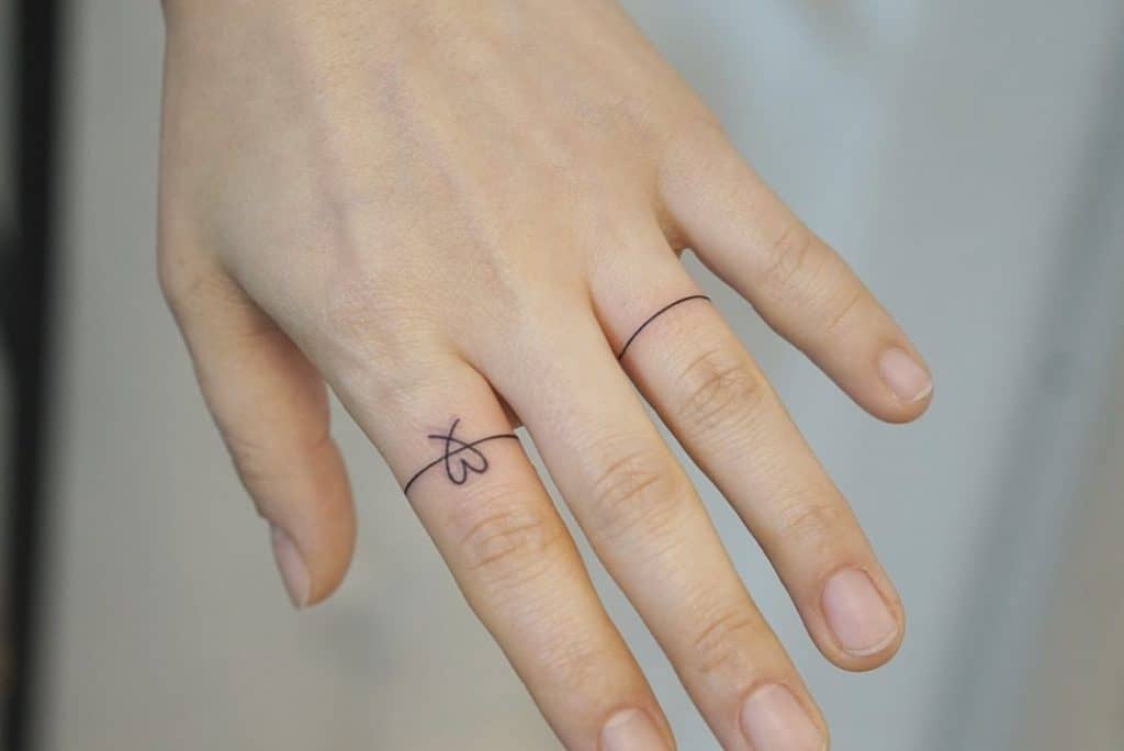 Small Ring Finger Tattoos