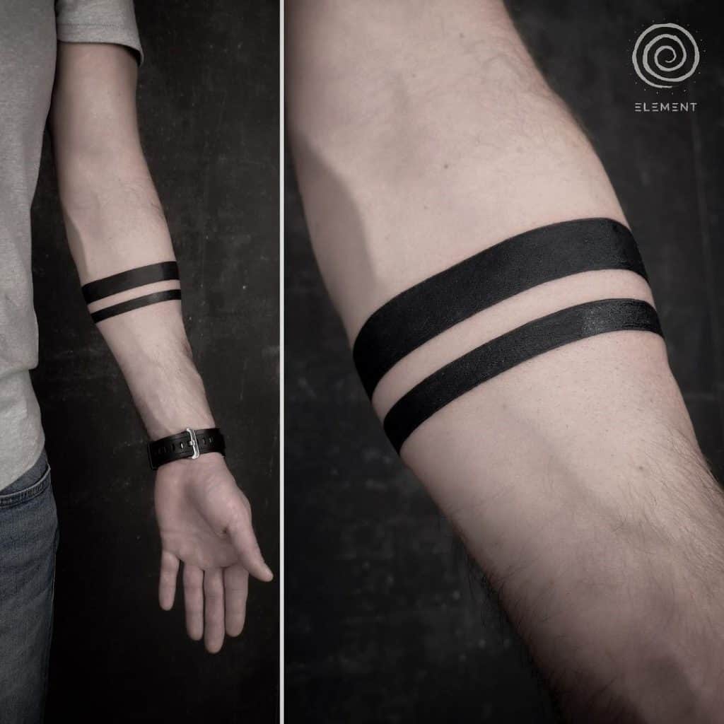Arm stripe tattoo meaning
