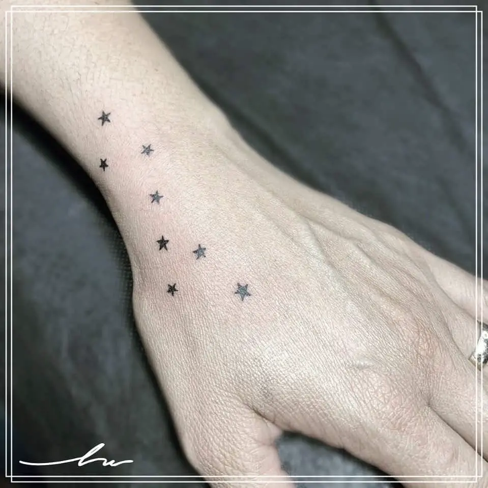 Star tattoos on arm meaning
