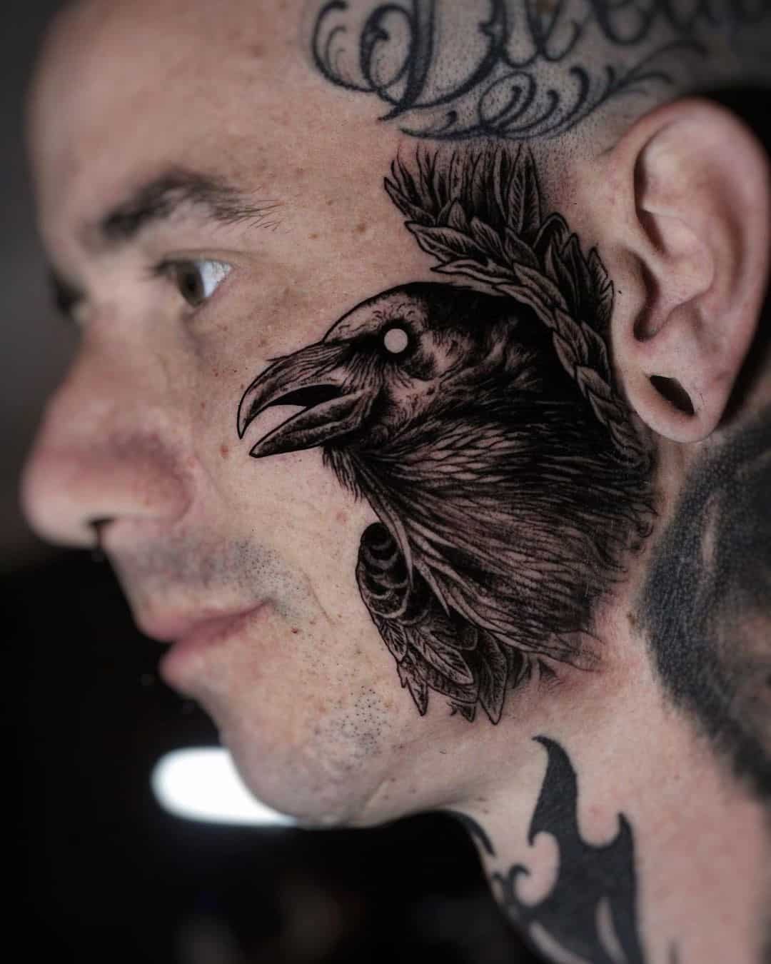 Unusual Face Piece Raven Tattoo