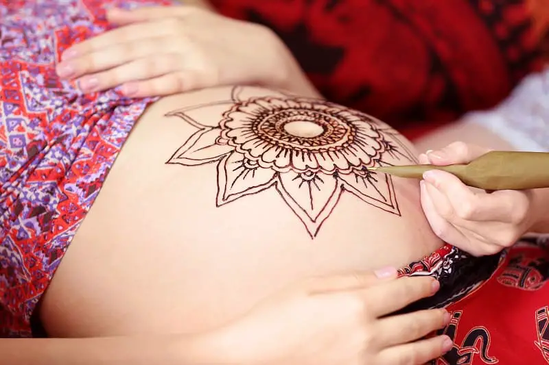 Can You Get A Tattoo While Pregnant? - Saved Tattoo