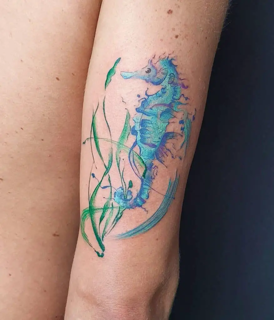 Bright Blue Seahorse Tattoo Over Arm