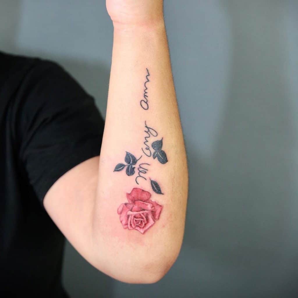 Rose Tattoo With Name Over Arm 