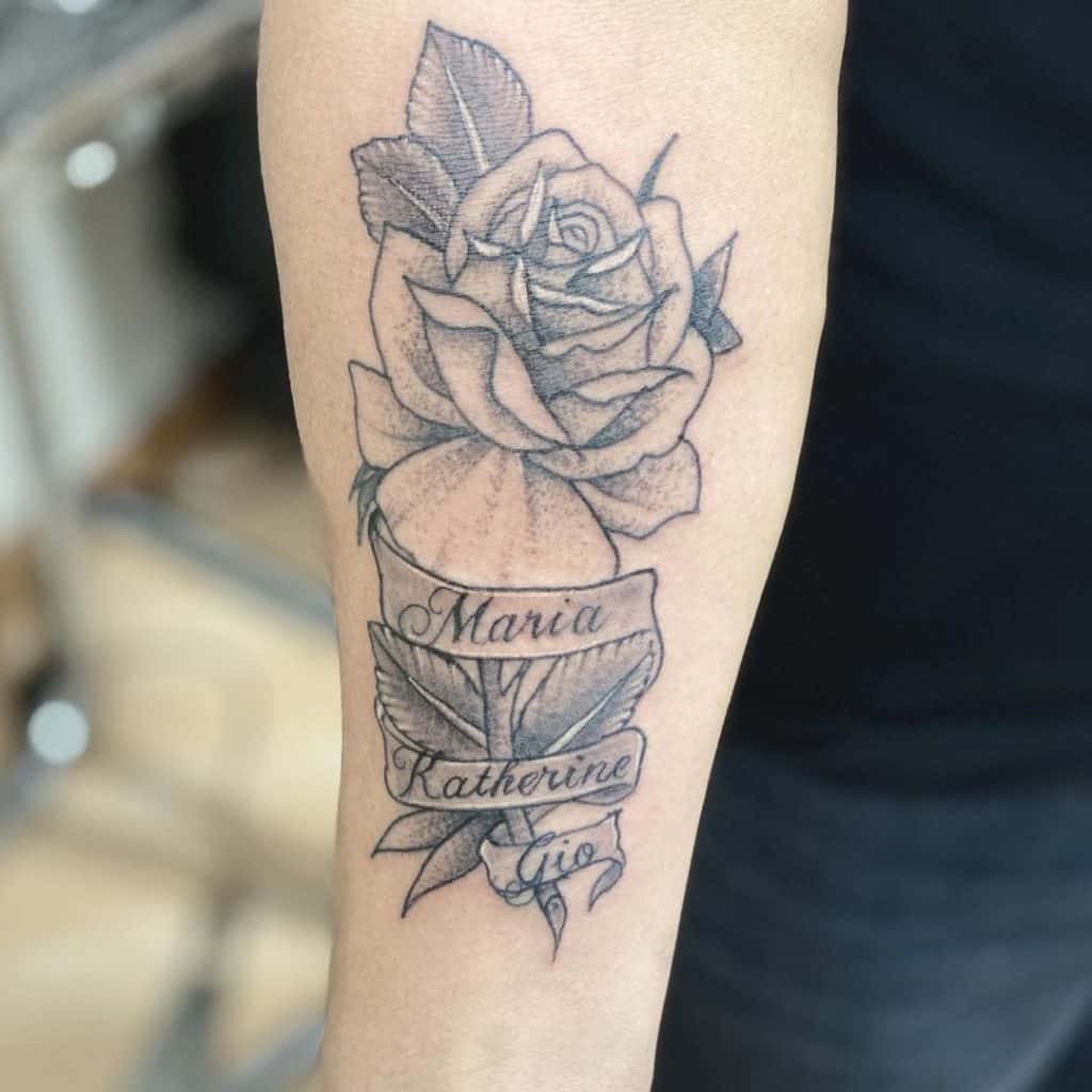 22 Beautiful Roses With Names Tattoo Ideas For Women - Saved Tattoo