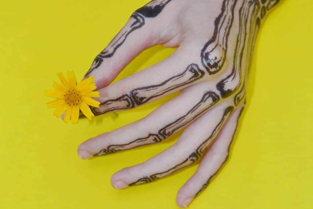 60+ Skeleton Hand Tattoo Ideas (and The Symbolism behind Them) 12 Skeleton Hand Tattoo, saved tattoo