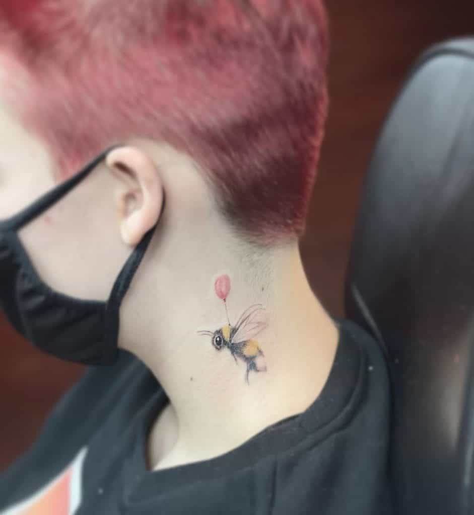 Bee neck tattoo 3