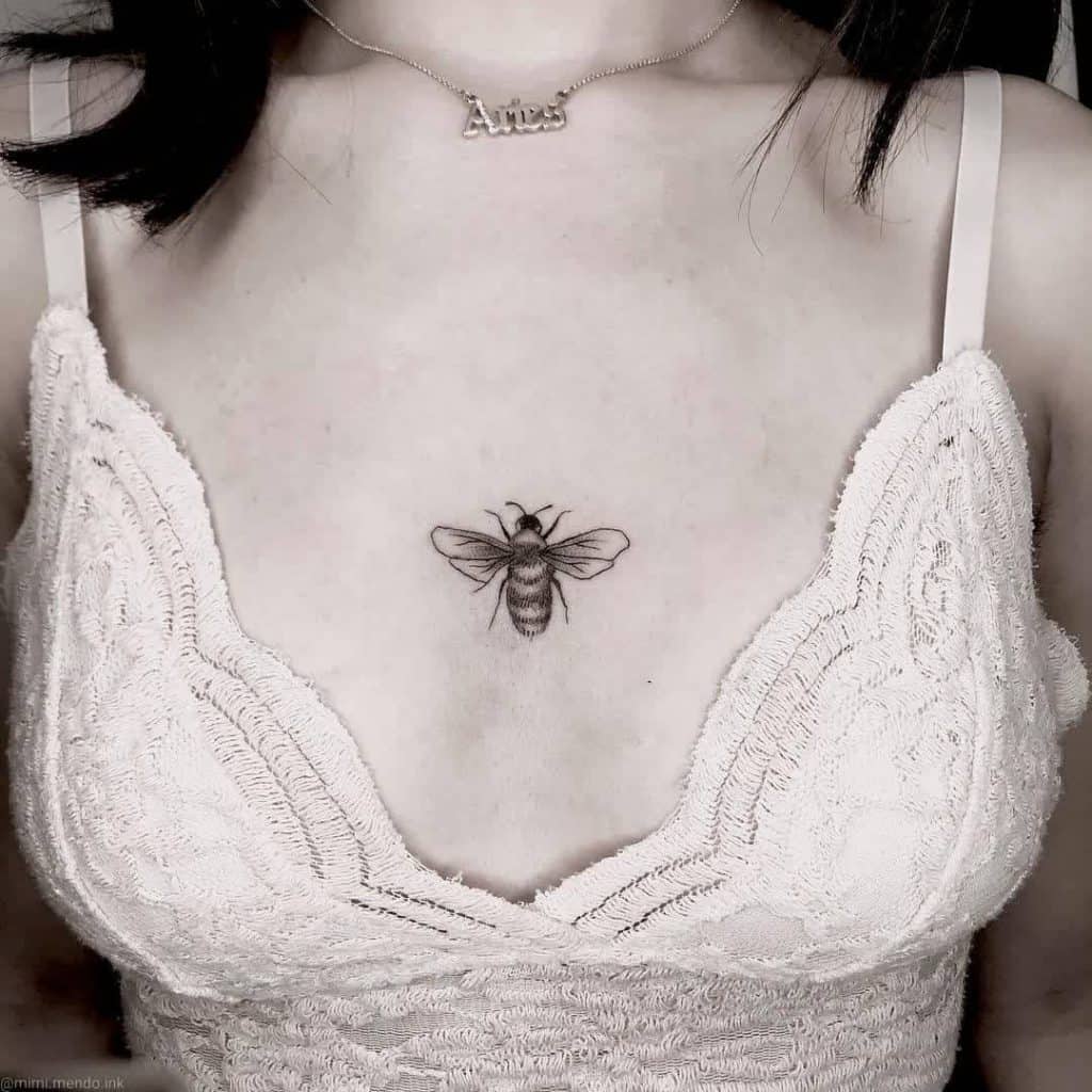 Bee tattoo on the chest 1