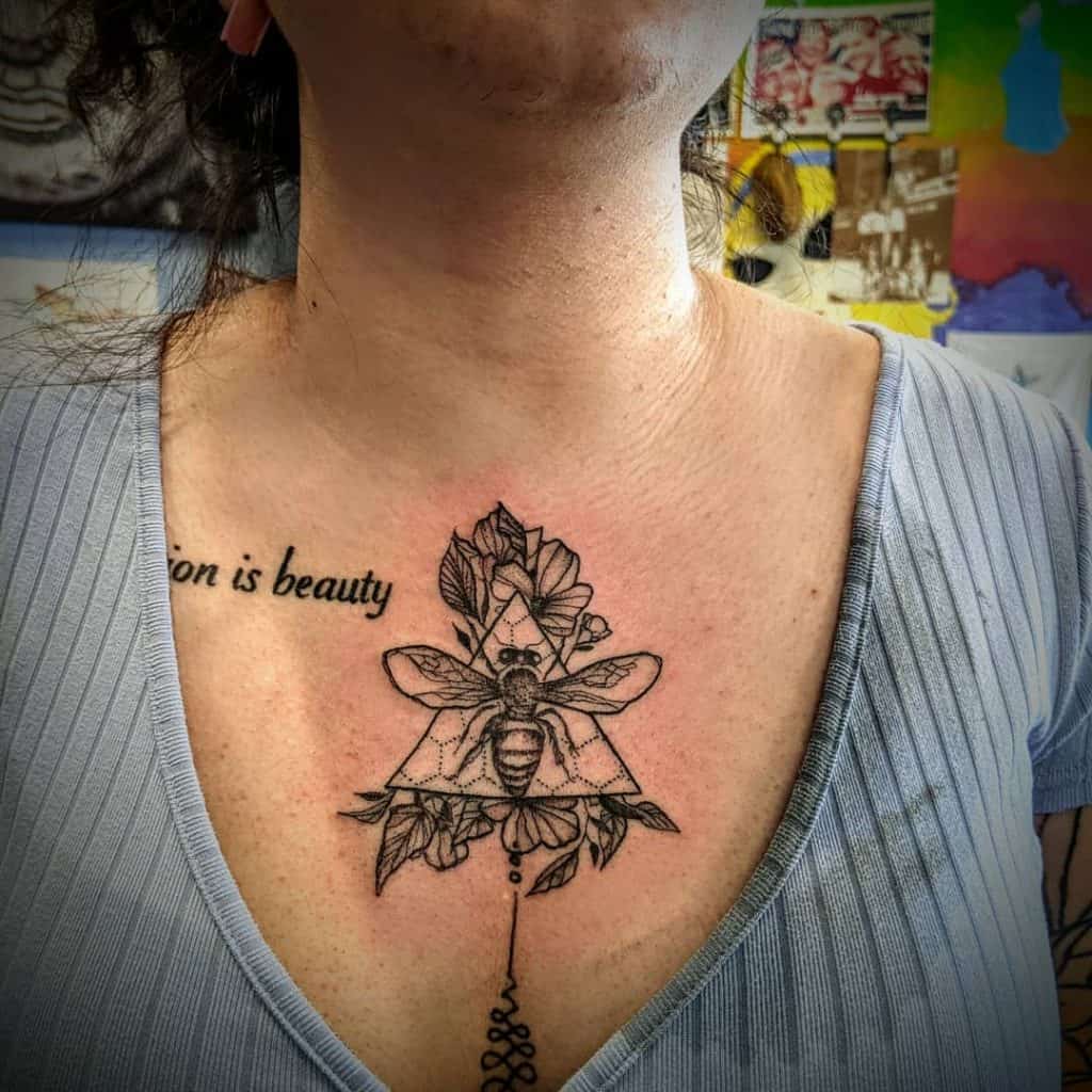 Bee tattoo on the chest 5