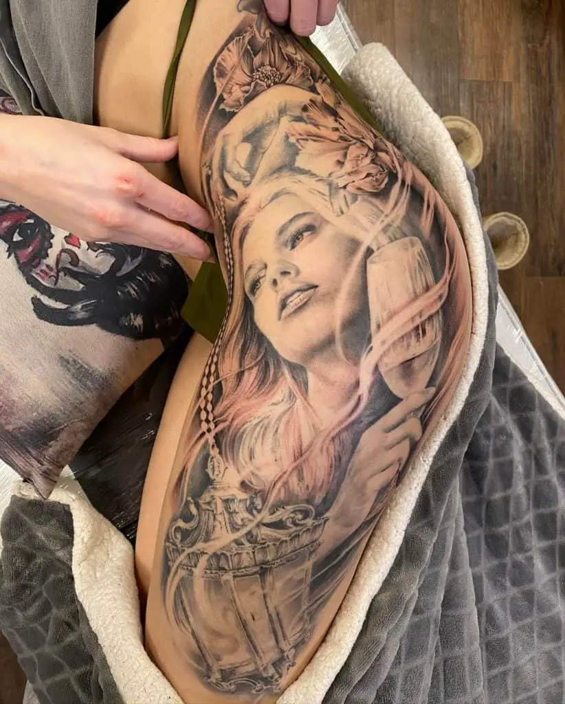 Black Portrait Tattoos On Hip And Thigh