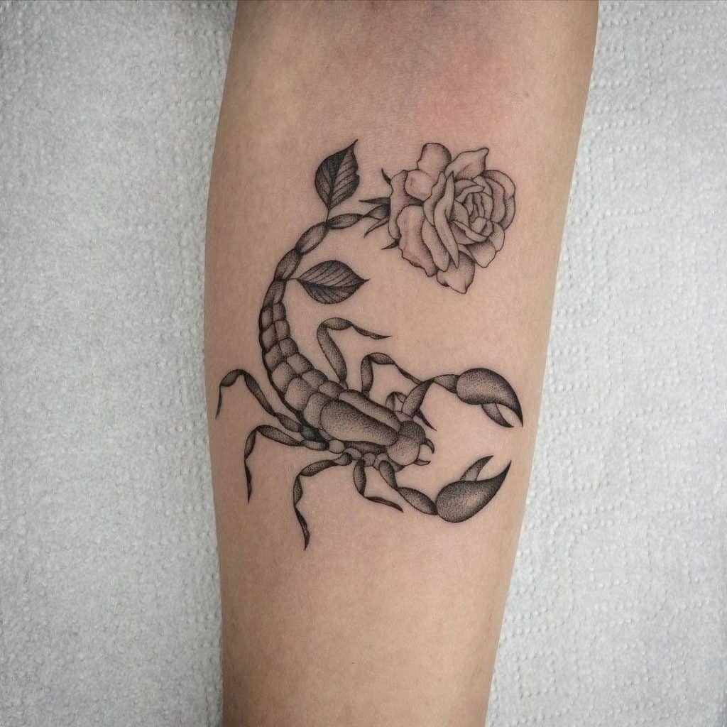 Black Scorpio Tattoo With Rose Detail 