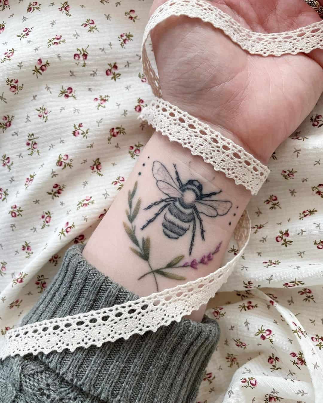 Lavender tattoo with bees 