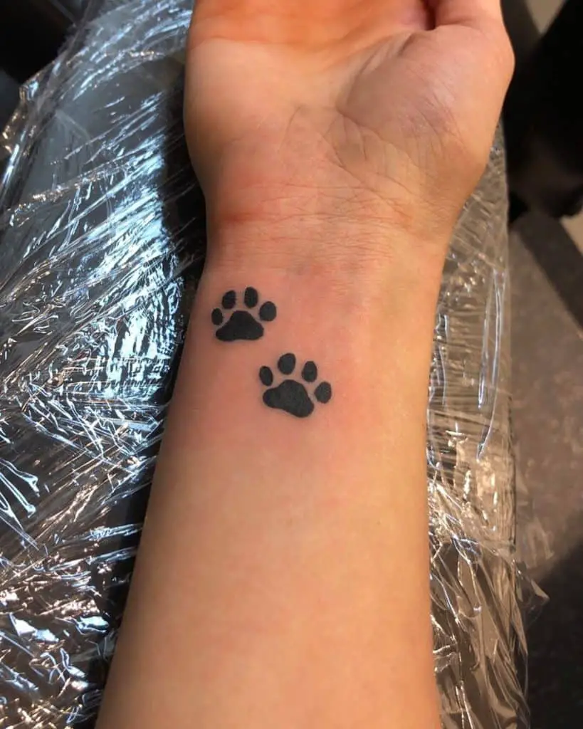 Dog foot print tattoo