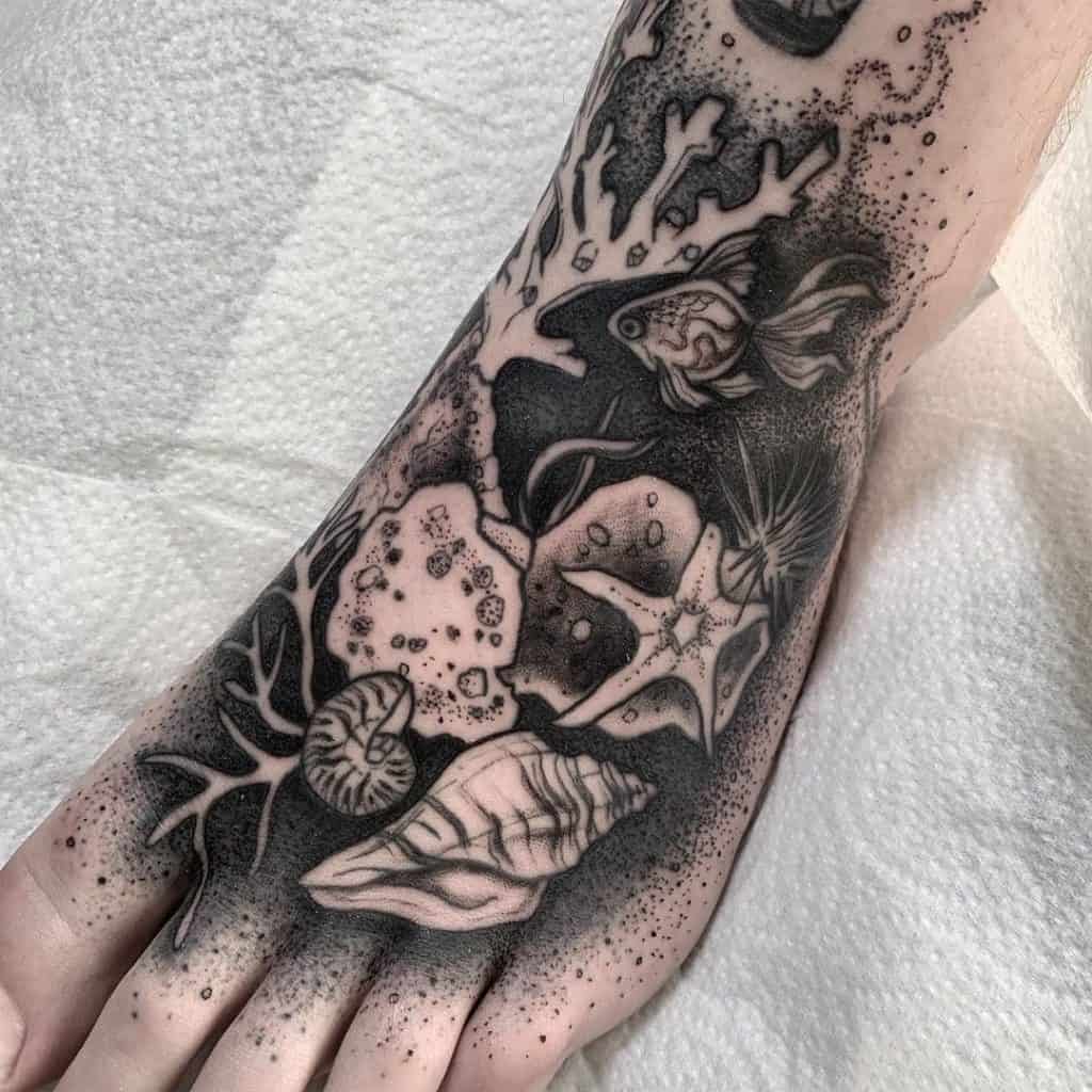 Sea Inspired Black Ink Foot Tattoo 