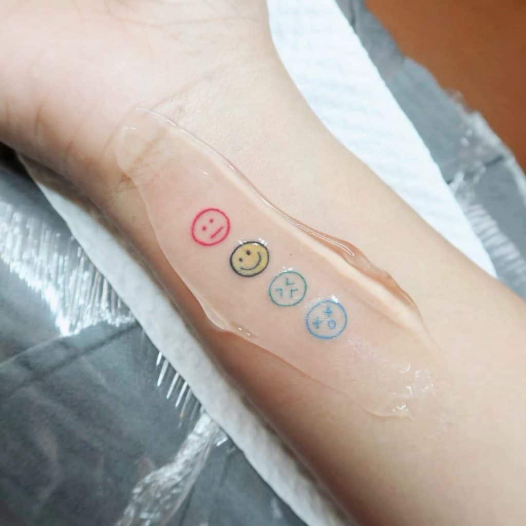 Small Smile Fine Line Tattoo 2