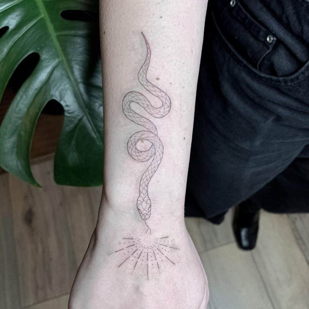 Sun and Snake Tattoo