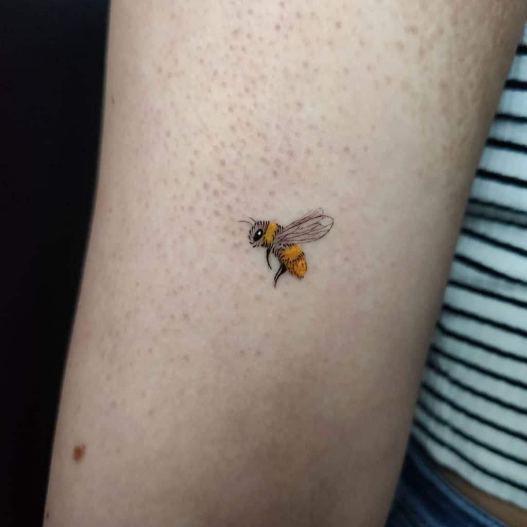 Tiny bee tattoo 3