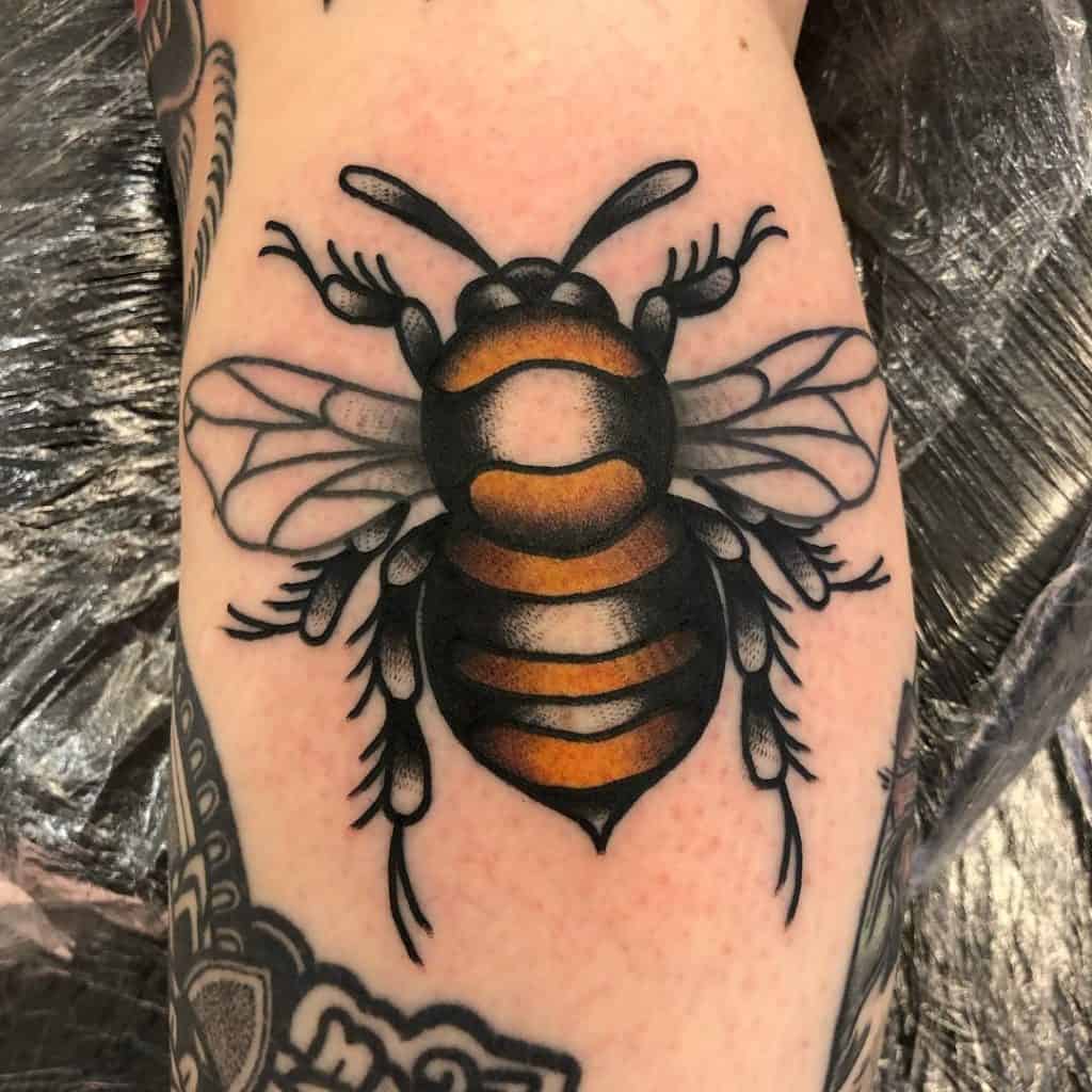 Traditional bee tattoo 4