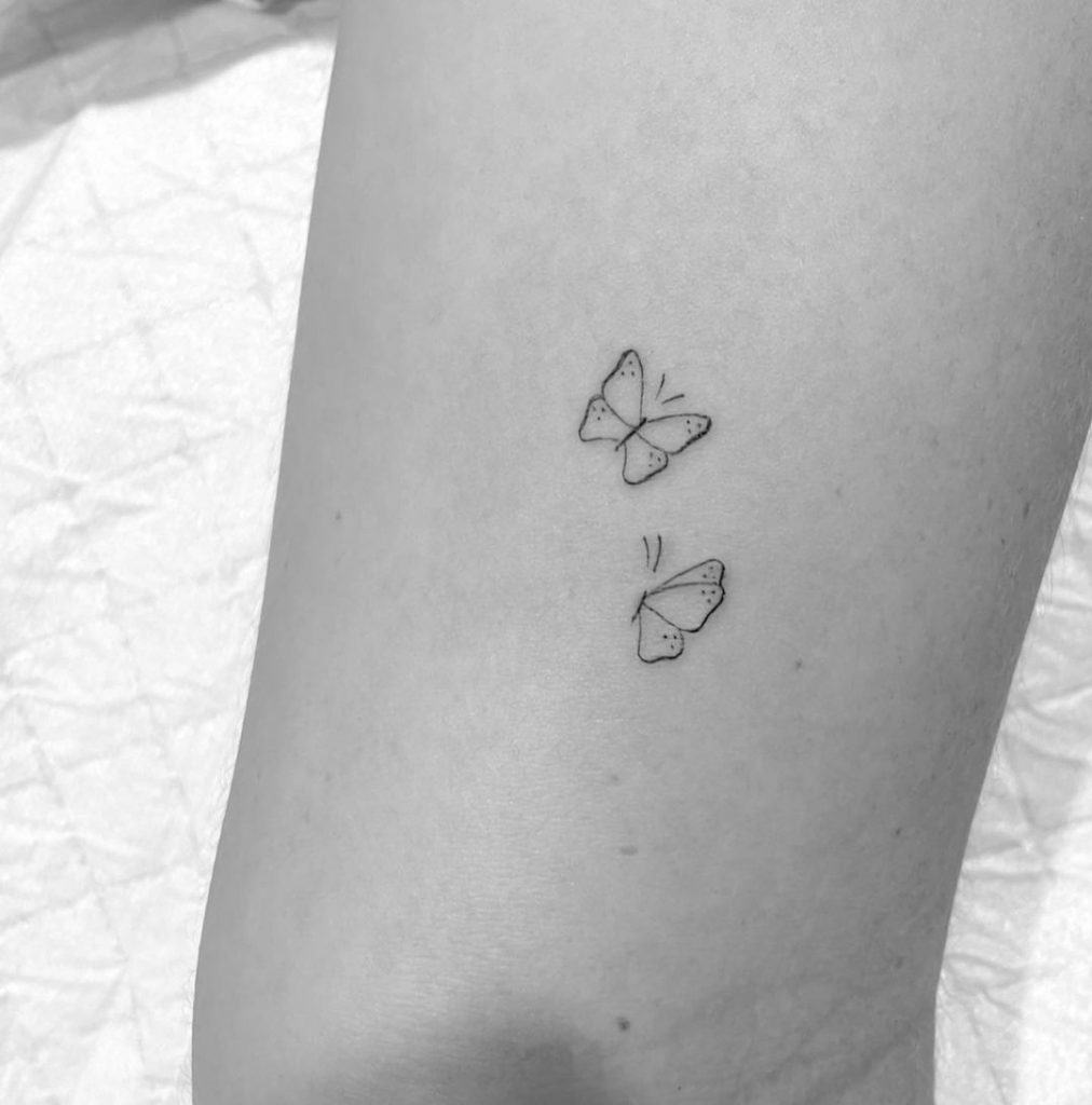 Whimsical Butterfly Fine Line Tattoos 1