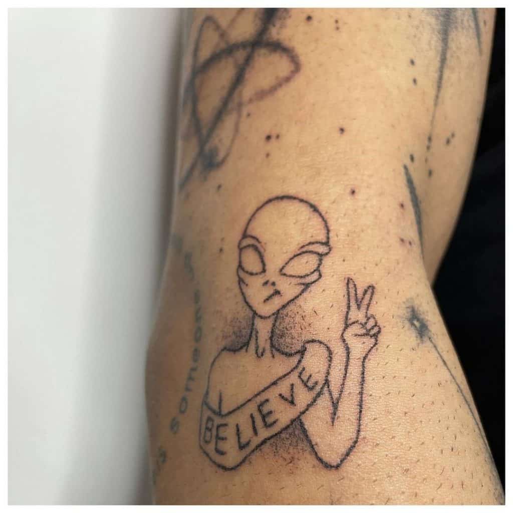 Alien Tattoo That Stands For Peace 
