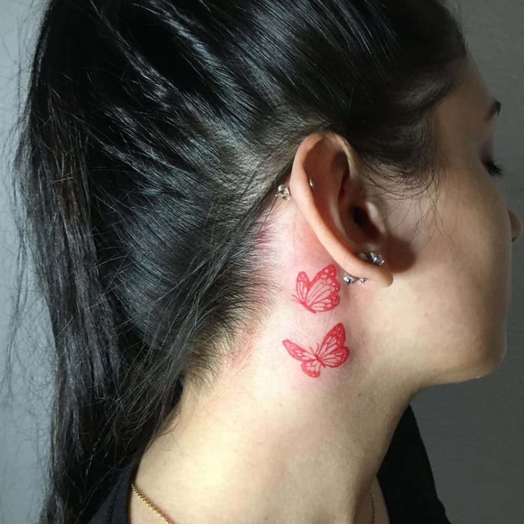 Butterfly neck tattoo 2