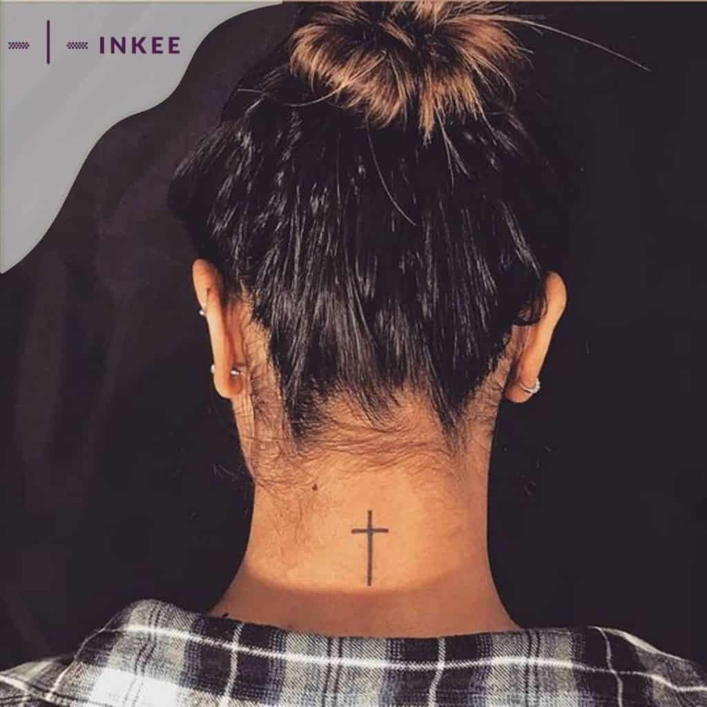 Women Cross neck tattoo 1