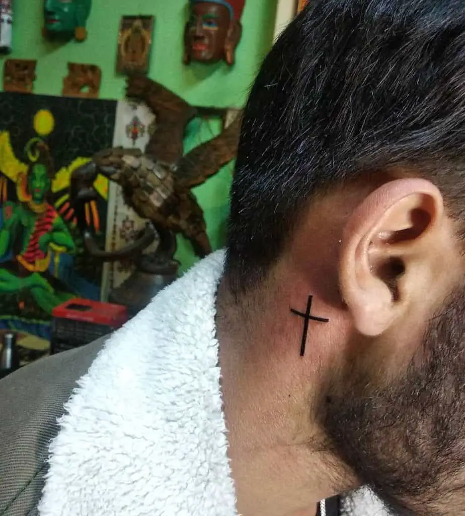 Cross neck tattoo 1