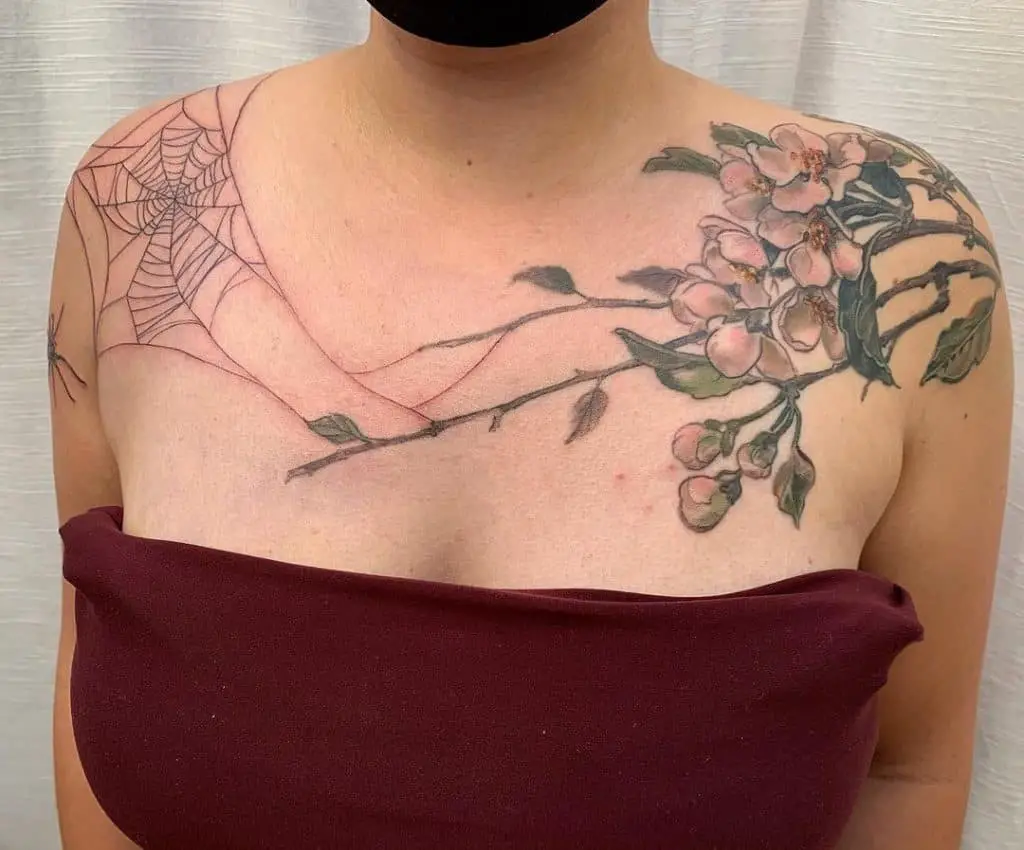 Flowers and cobweb tattoos