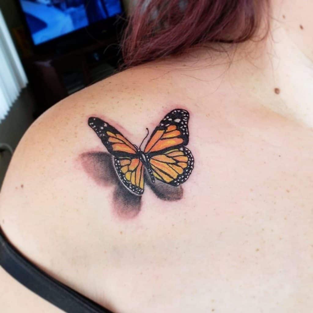 Butterfly shoulder tattoos for females