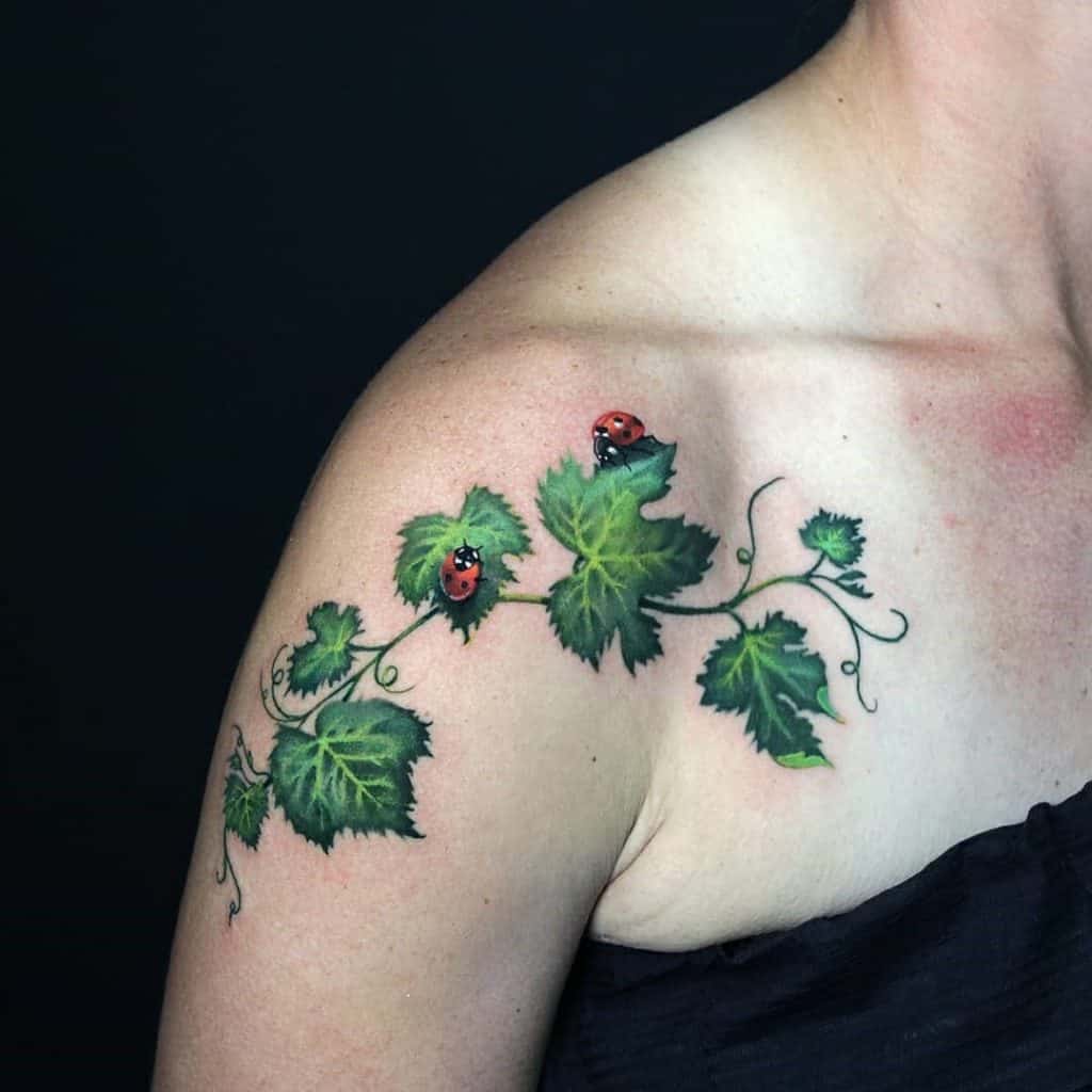 Large Green Front Shoulder Tattoo For Women 