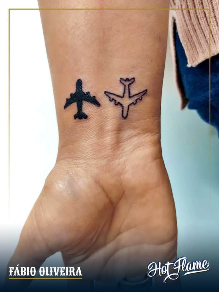 Matching Airplane Tattoo Over Wrist 