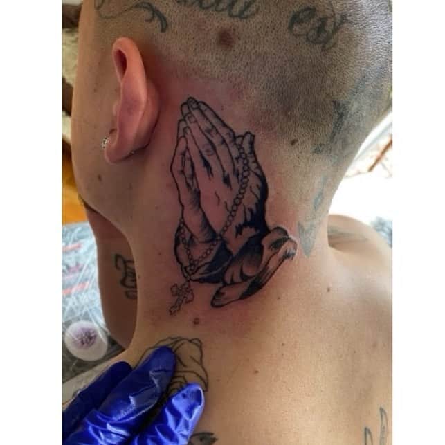 Religious neck tattoo 4