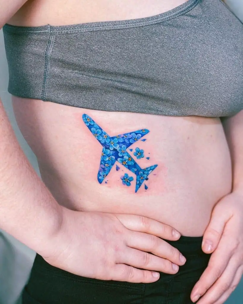 Side Stomach Colorful Airplane Tattoo 