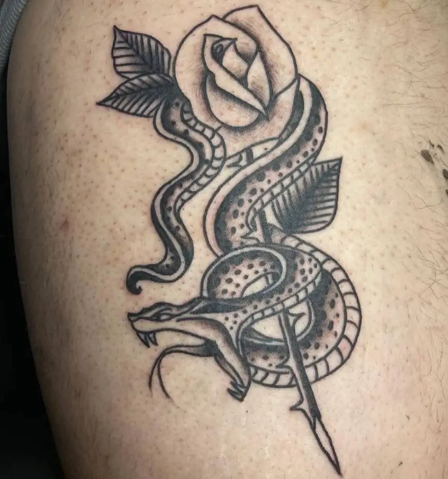 Snake and flower tattoo