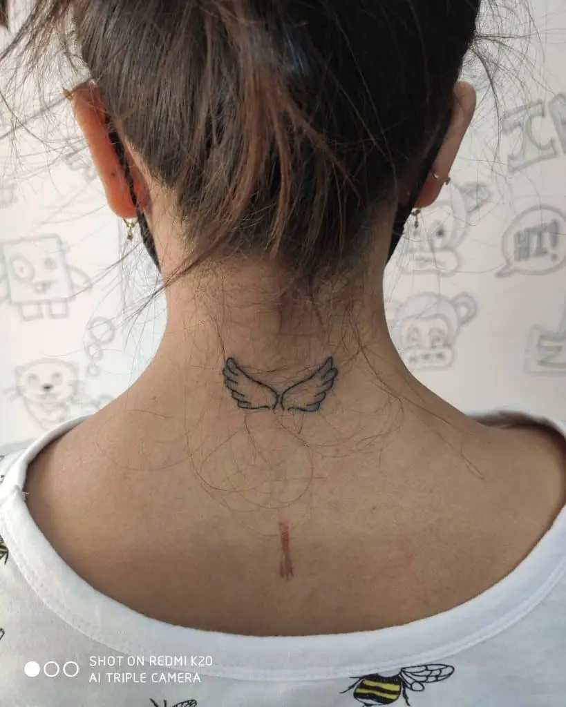 Wings neck tattoo 2