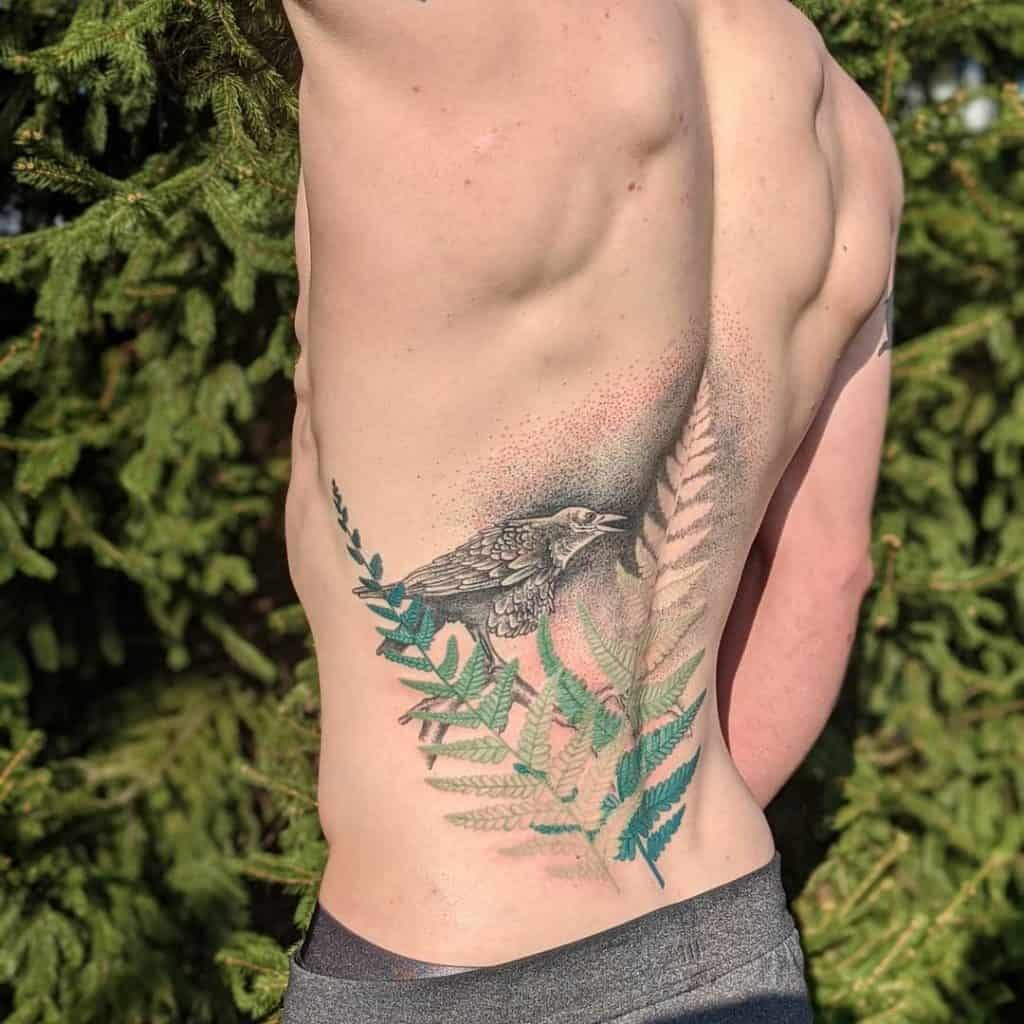 Back Fern Tattoo With Bird Idea