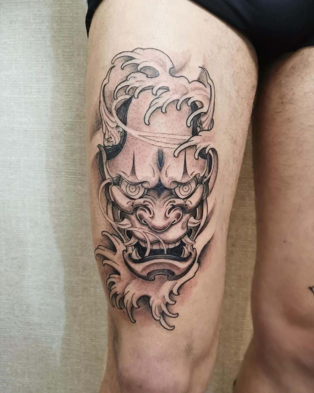 Black Ink Thigh Tattoo Oni Mask 