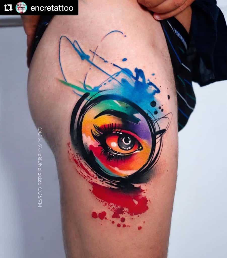 Dramatic Thigh Rainbow Tattoo 