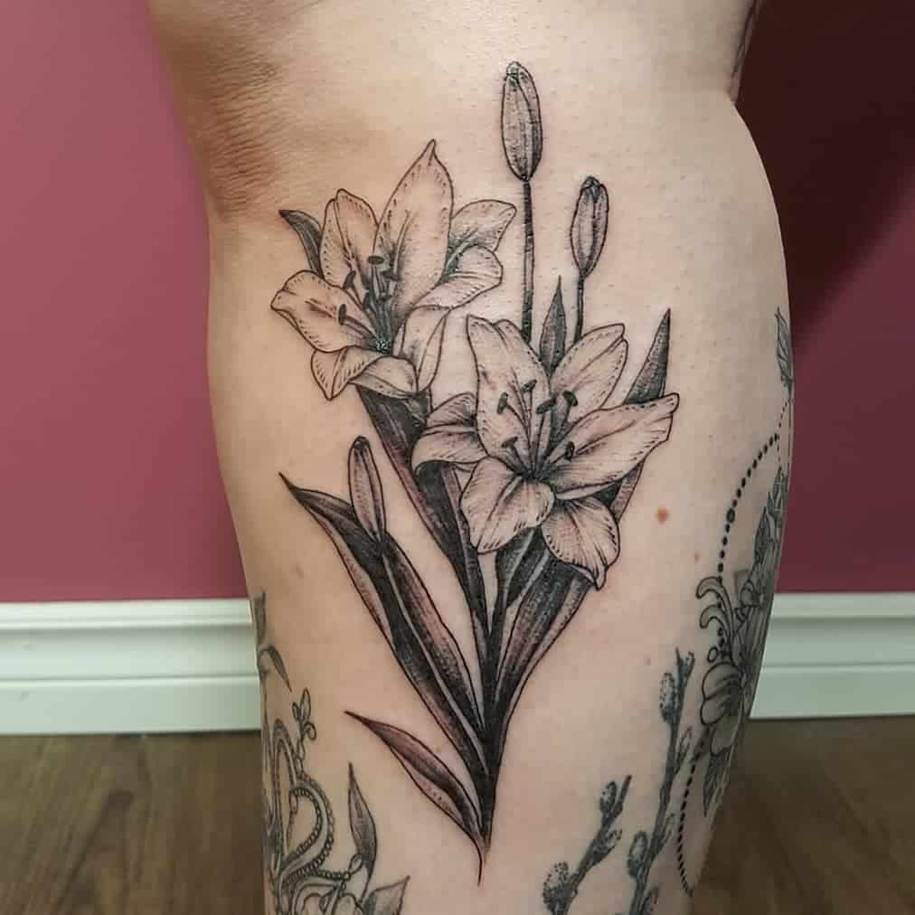 30+ Best Lily Tattoos and Their Meanings - Saved Tattoo