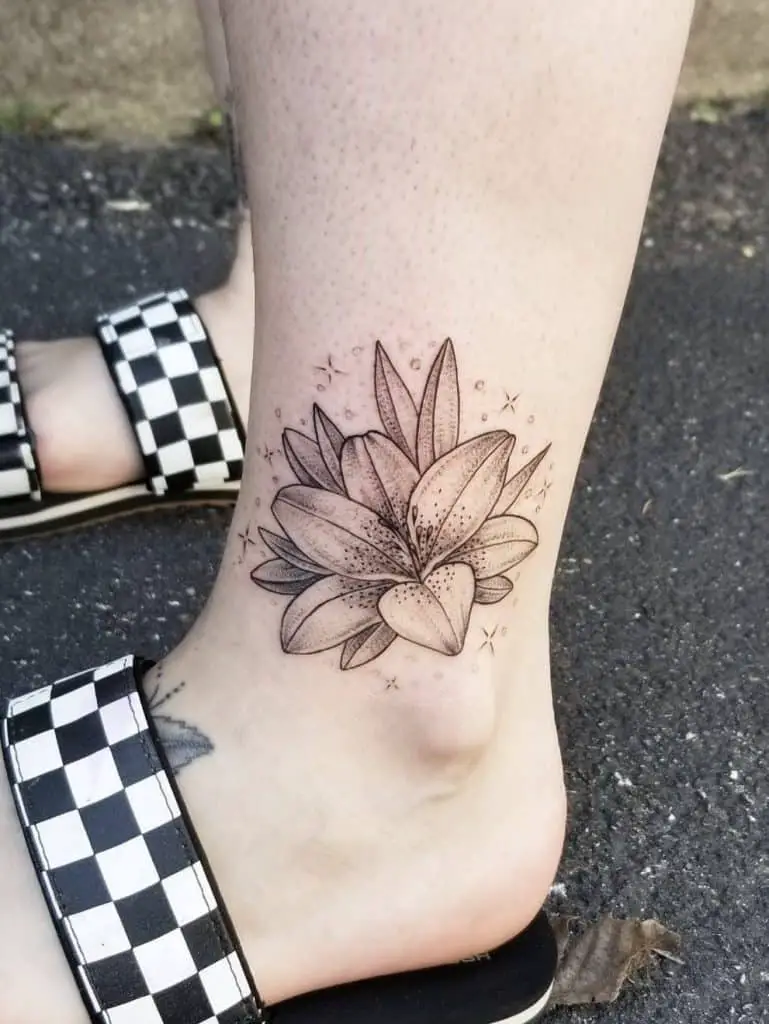 Share 78+ larkspur and water lily tattoo latest - thtantai2