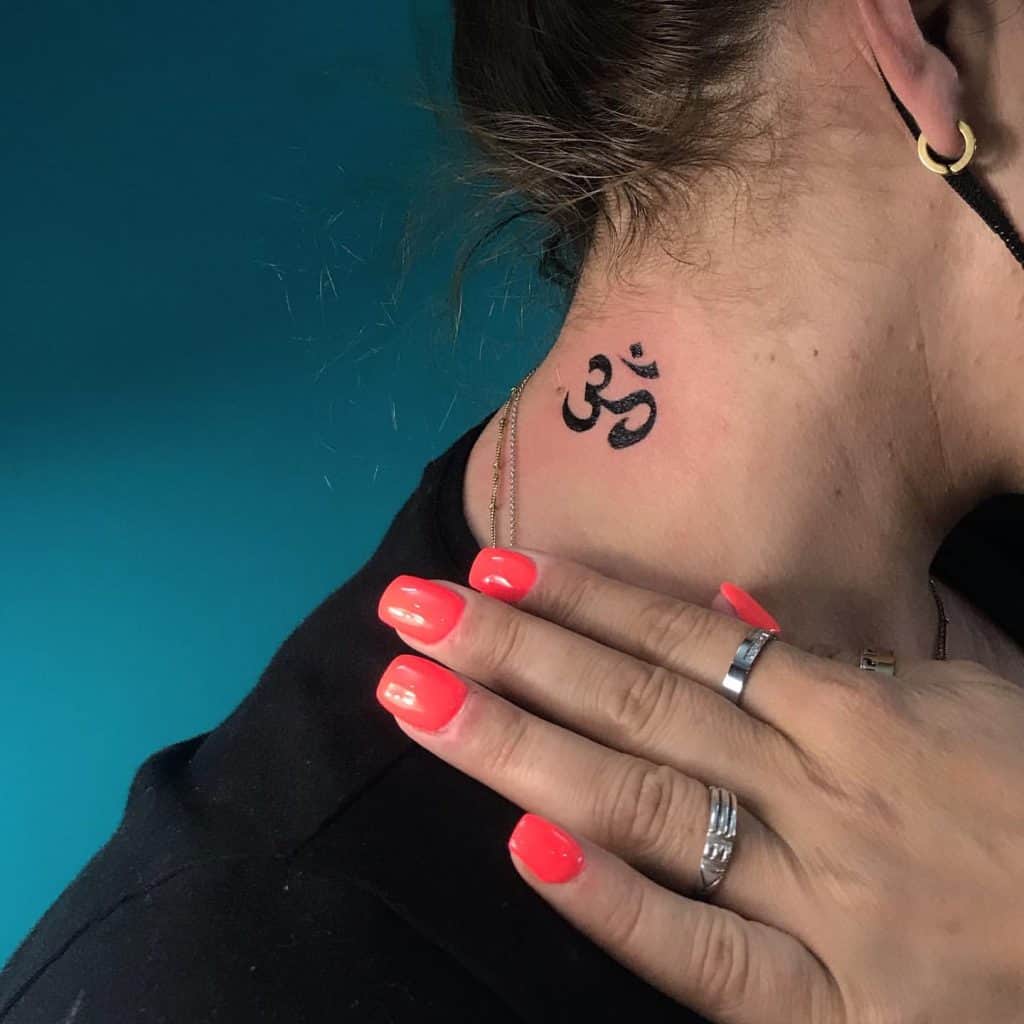 Ohm tattoo with big meanings 5