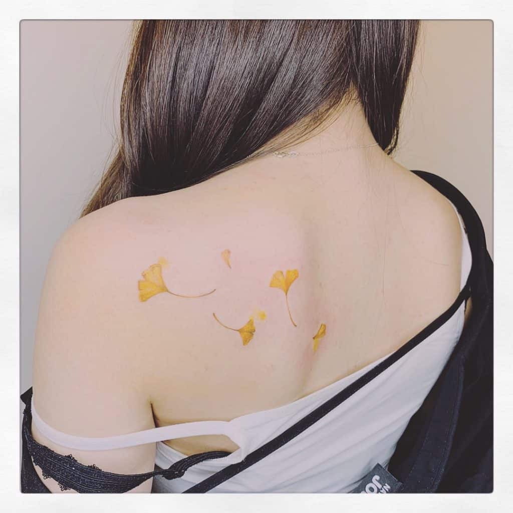 Pros Cons of yellow and orange tattoos 1