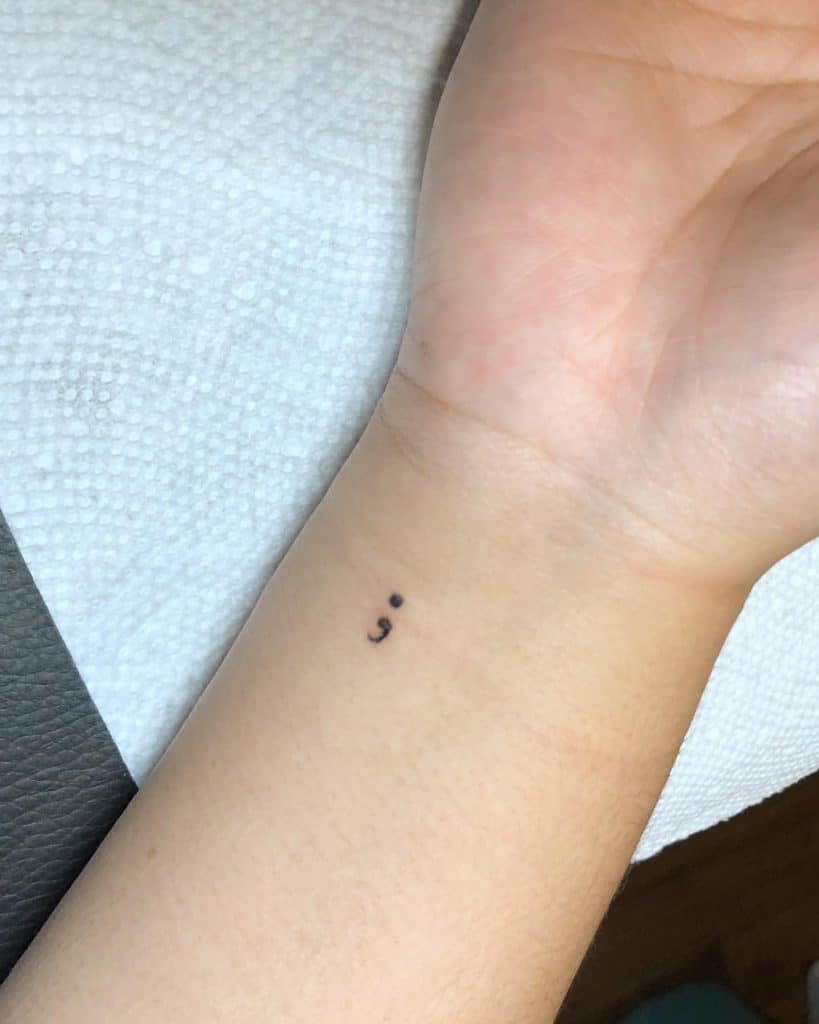 Semicolon tattoo with big meanings 1