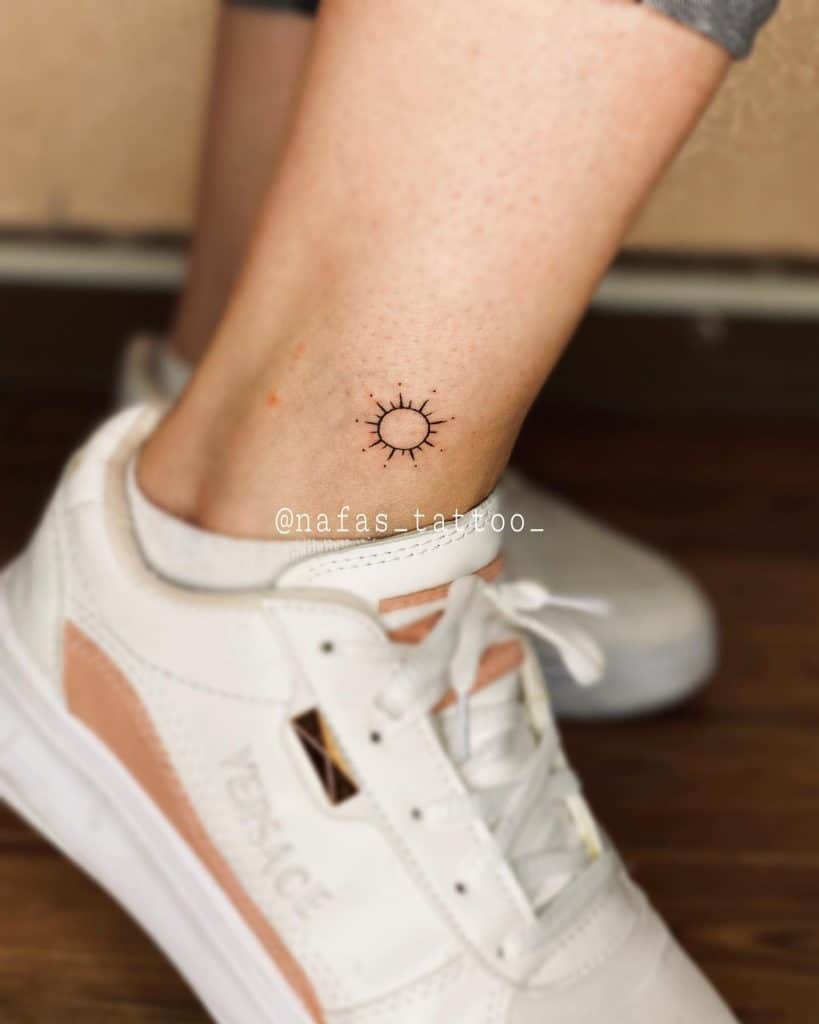 Sun tattoo with big meanings 1